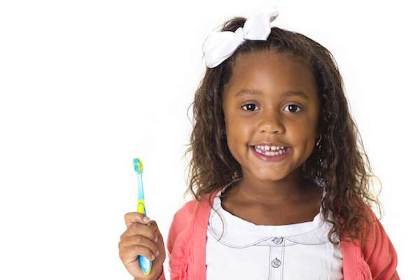 Should I Take My Child To A Kid Friendly Dentist In Columbus For White Spots On Teeth?